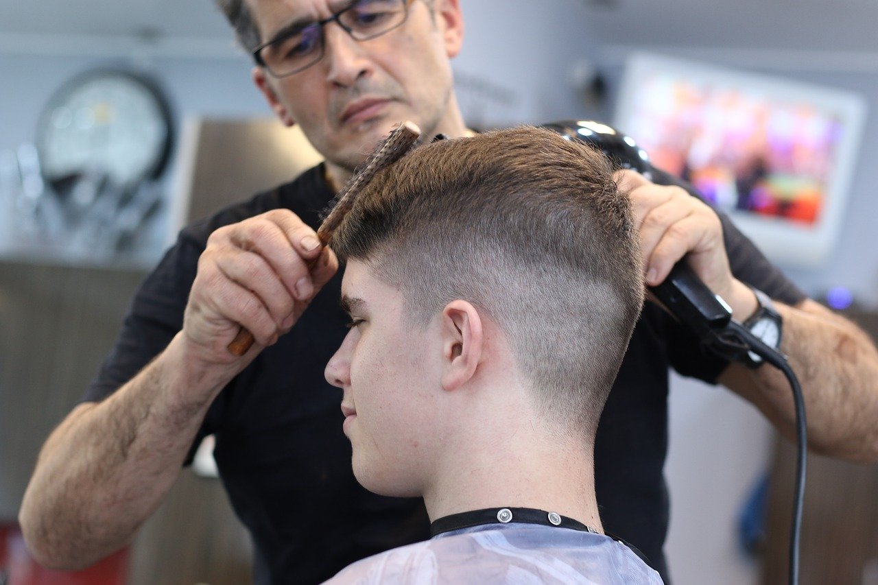 A barber cutting hair